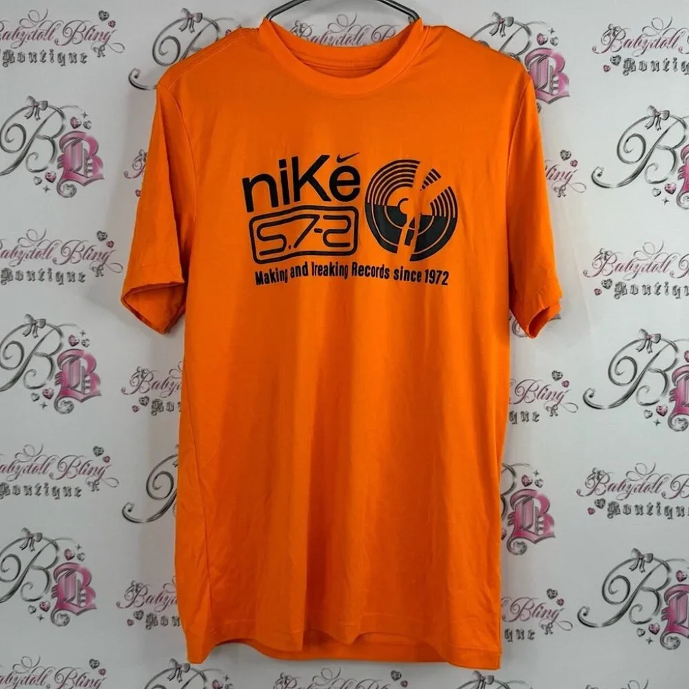 Nike tshirt dri-fit the Nike tee since 1972 Orange Graphic Short Sleeve Tee - Picture 1 of 7